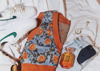 a pair of shoes on a bed