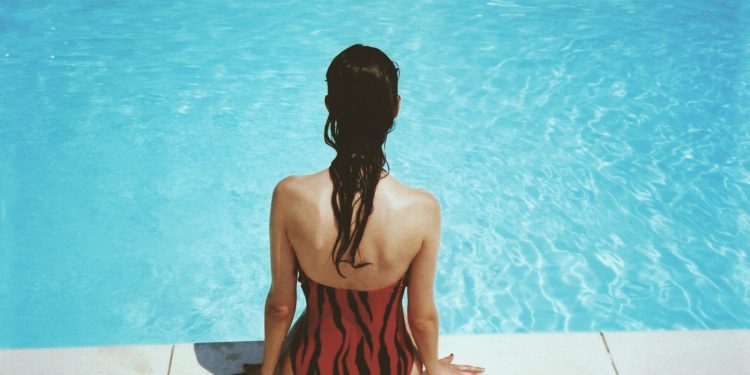 woman wearing black and red monokini